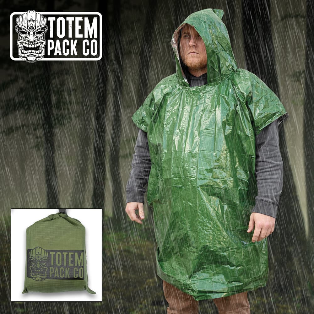 Full image of the green Totem Pack Co. Camping Rain Poncho being worn by a person. image number 0
